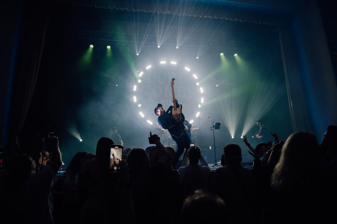 Dan performing live on stage with the Luke Combs UK tribute show