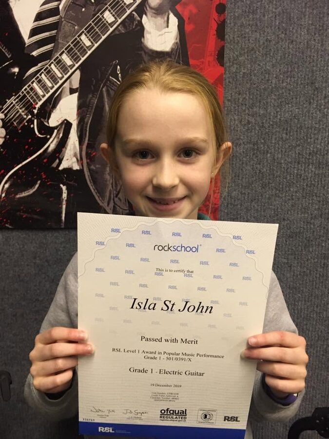 Isla St John passes Grade 1 with Merit