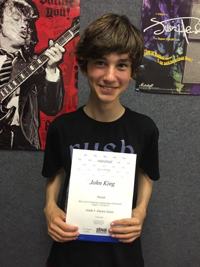 John King passes Grade 5